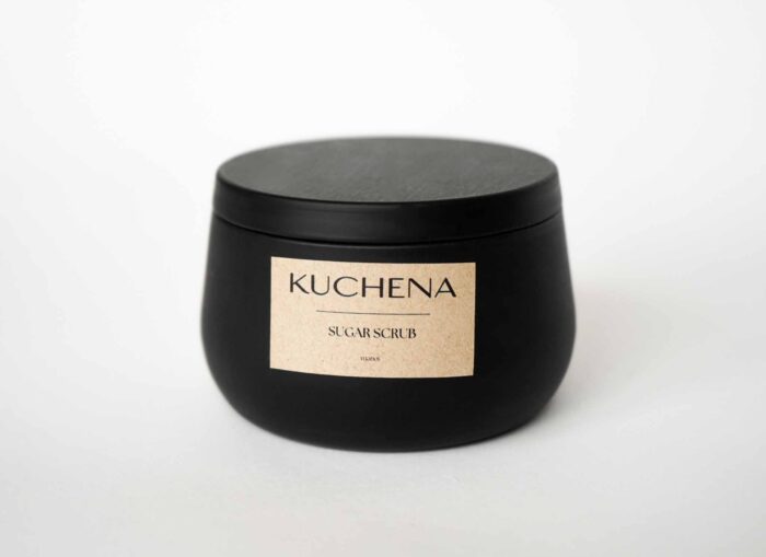 lack KUCHENA sugar scrub container with monoi fragrance label.